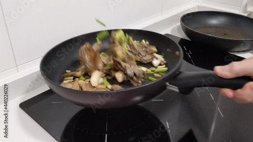 Organic and healthy mushrooms frying in a pan. photo