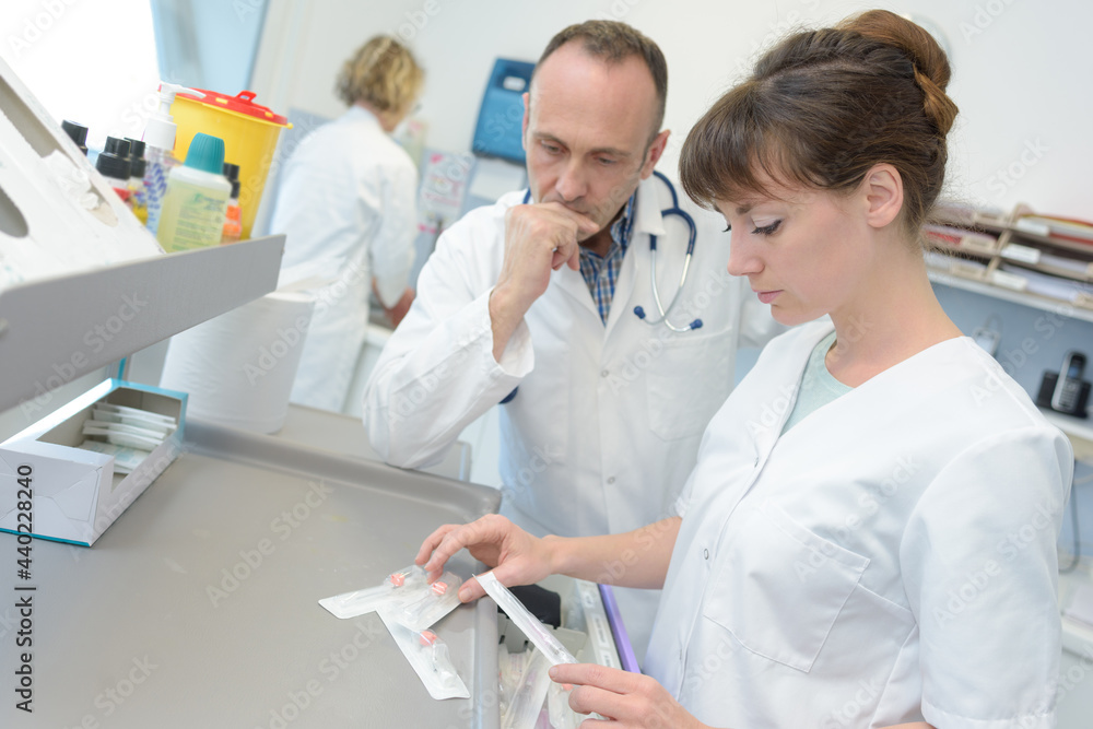 two doctors in a lab two doctors in a lab