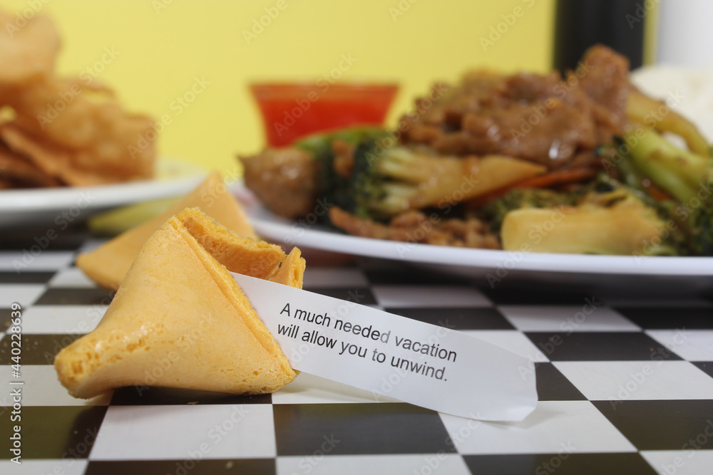 Fortune Cookie on table A Much Needed Vacation Will allow you to unwind Fortune Cookie on table A Much Needed Vacation Will allow you to unwind