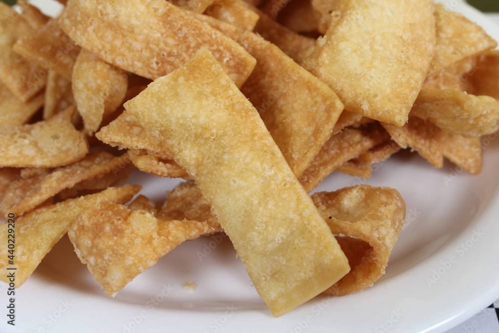 Fried Chinese Wonton Snack Chips Served in Asian Restaurant Fried Chinese Wonton Snack Chips Served in Asian Restaurant