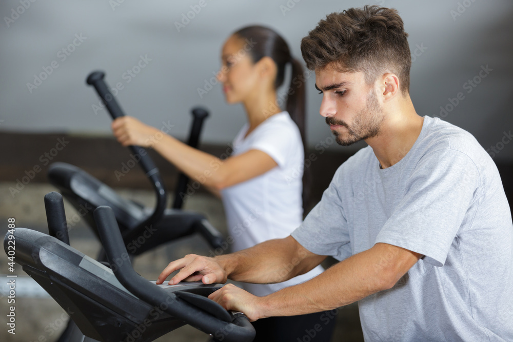 a man inserting his personal program a man inserting his personal program