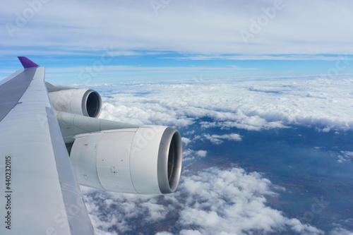 Photography The aircraft wing with the clear blue sly