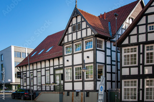 BUNDE, GERMANY. JUNE 12, 2021. DeLaCasa Cafe backyard. Beautiful view of small german town with typical architecture. Fachwerk style.