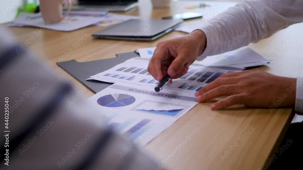 Businessman using hand gesture while explain business report and discussion in the meeting finally the deal accepted. Selected focus. 4K Businessman using hand gesture while explain business report and discussion in the meeting finally the deal accepted. Selected focus. 4K