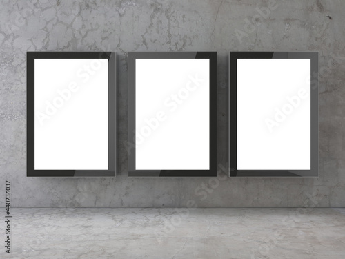 Three empty Glass Lightboxes Mockup on the concrete wall, advertising billboard