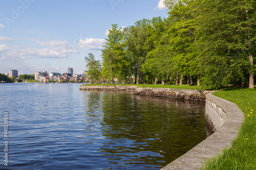 View of Tampere city over the lake Pyhäjärvi and Hatanpää arboretum in Finland in the summer.