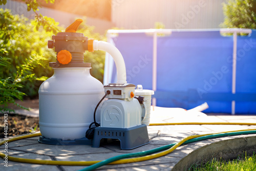 Pool water filtration system, outdoor sand pump. Maintaining the purity of water, cleaning from dirt, dust and debris. Service of the frame pool.