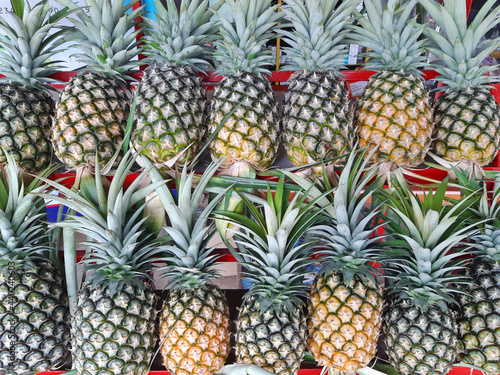 A texture of ffresh pineapple in market photo