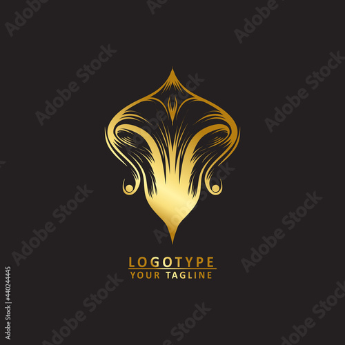 Golden taper logo with black background