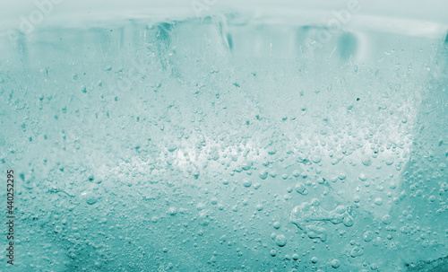 Ice texture with small round air bubbles trapped inside 