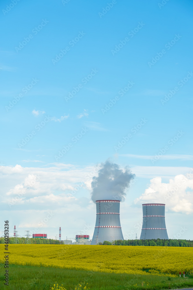 Belarusian nuclear power plant in Ostrovets on a sunny summer day, Belarus 2021. Vertical photo