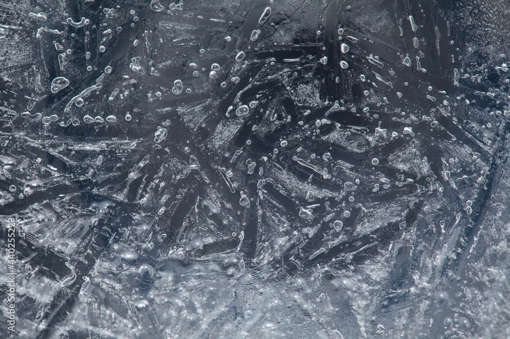 Ice texture with small round air bubbles trapped inside Ice texture with small round air bubbles trapped inside