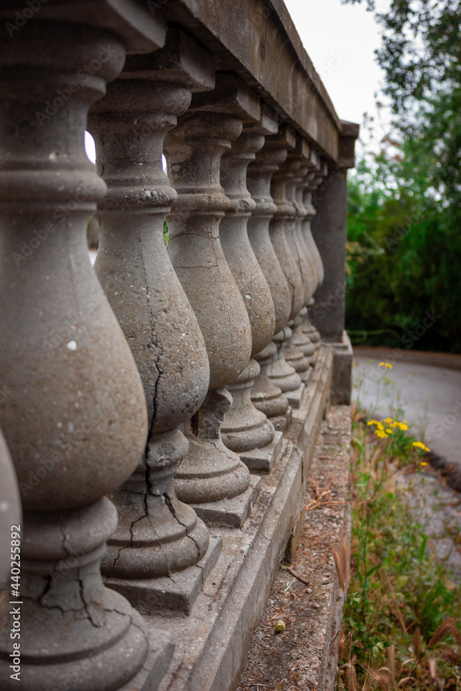 Old balustrade. Concrete balusters. Cracked balustrade. Old balustrade. Concrete balusters. Cracked balustrade.