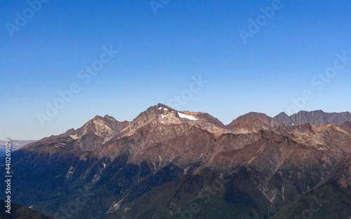 daytime landscape in the Caucasian mountains against the blue sky