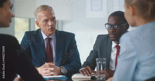 Handshake of business people at meeting in office