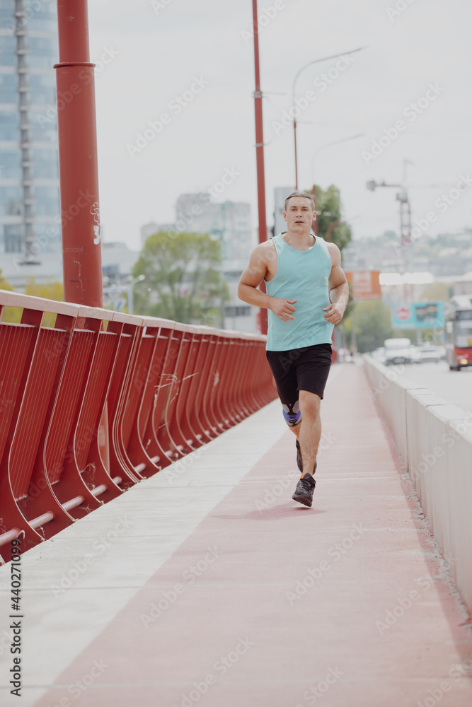 Man running jogging on the bridge Man running jogging on the bridge