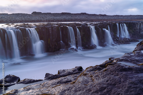 A magnificent view of the numerous streams of waterfalls flowing down to the river at the Dettifoss, Iceland