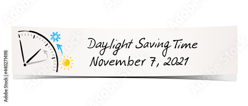 Paper banner with handwritten reminder and hand drawing of the daylight saving time for autumn 2021. 