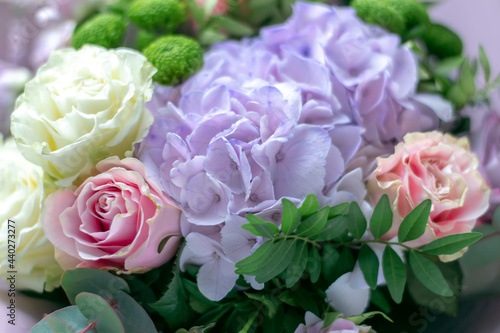 Bouquet of roses and hydrangeas close-up, soft focus.