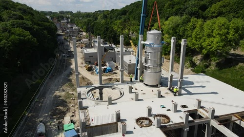 Wallpaper Mural Installing a huge piece of heavy equipment. Aerial view on the construction site.  Torontodigital.ca