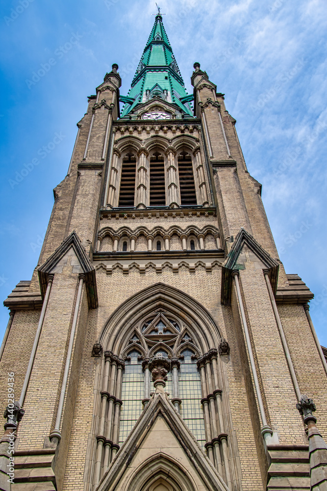 Fototapeta premium Colonial clock and bell tower of the Saint James Cathedral in Toronto, Canada