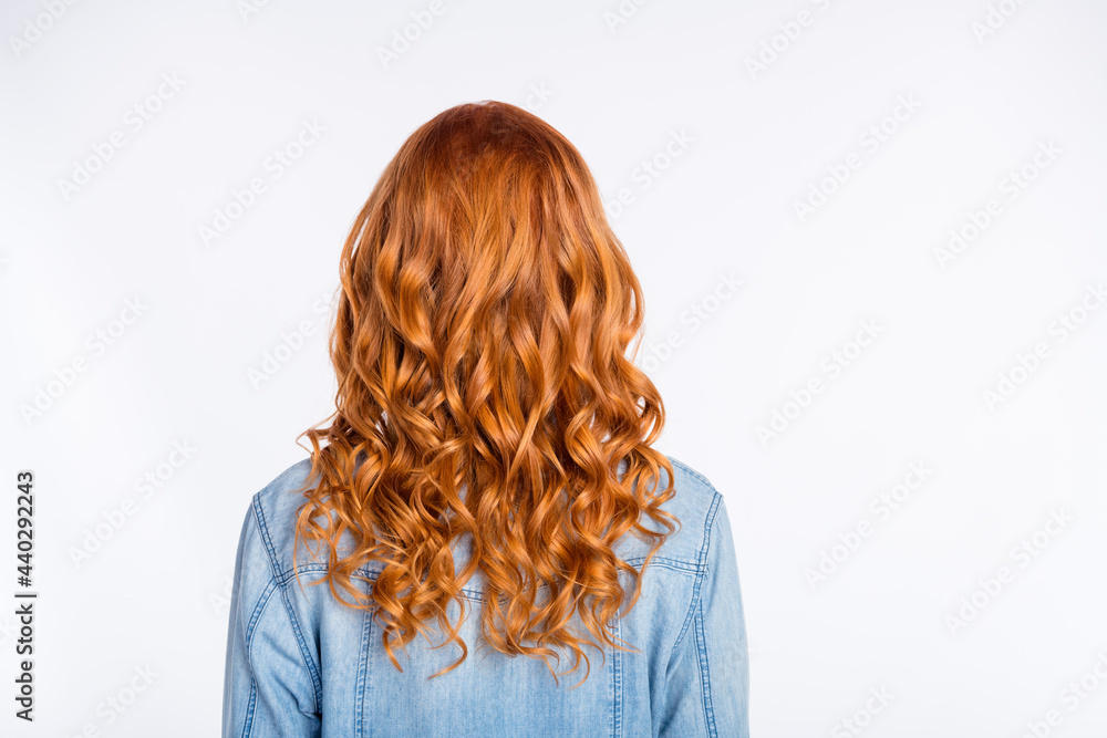 Fototapeta premium Rare view photo of woman with red curly hair wearing casual jeans jacket isolated on white color background