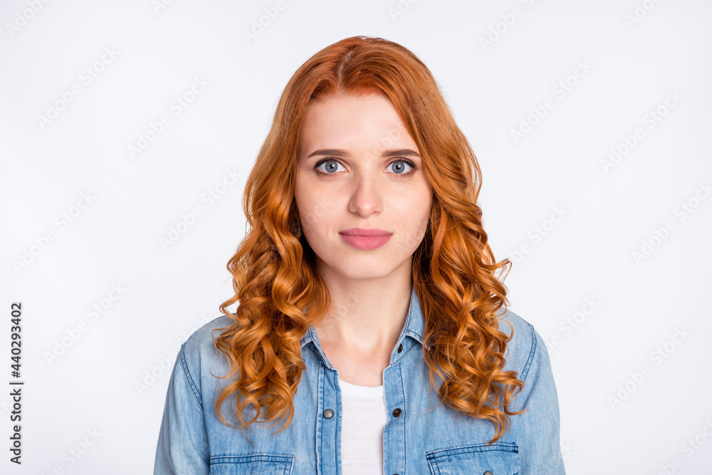 Photo of young attractive girl happy positive smile curly ginger hair isolated over grey color background Photo of young attractive girl happy positive smile curly ginger hair isolated over grey color background
