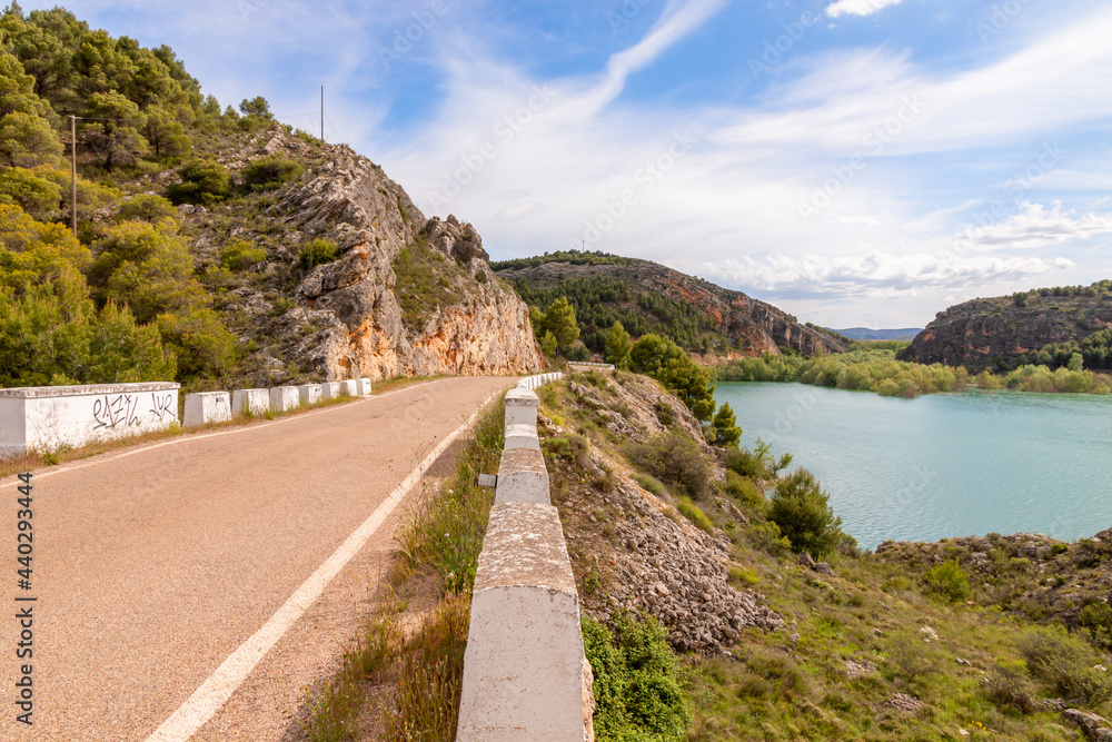 Beautiful road of Tranquera water reservoir in Nuévalos, Zaragoza, Aragón, Spain. Picture captured in a sunny summer day.