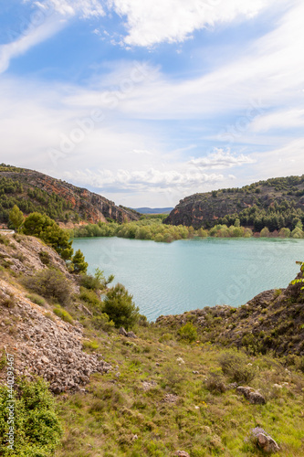 Fototapeta Naklejka Na Ścianę i Meble -  Tranquera reservoir situated in Nuévalos, Zaragoza, Aragón, Spain. Beautiful lake with mountains around it.