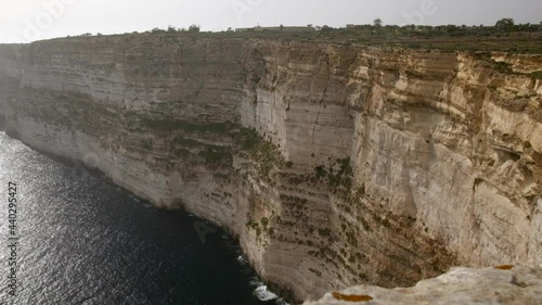 Panoramic view of Ta Cenc cliffs on the island of Gozo in Malta. photo