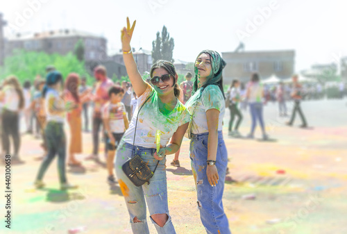 the lots of people in the color fest, colored faces of the peoples, color festival in india © Gegham