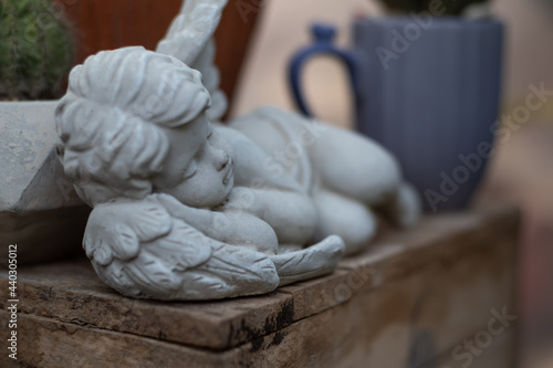 A statue of a goddess that is both beautiful and cute.