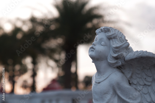 A statue of a goddess that is both beautiful and cute.