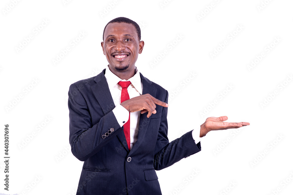 portrait of a businessman presenting with his hand, smiling. portrait of a businessman presenting with his hand, smiling.