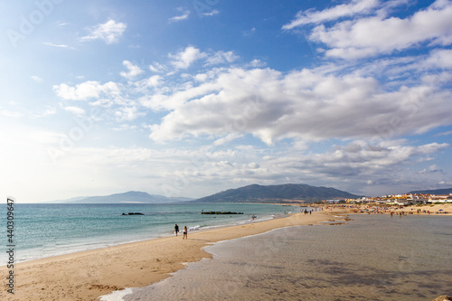Fototapeta Naklejka Na Ścianę i Meble -  View of golden mile beach in Tarifa city, Cadiz , Costa de Luz, Spain. Famous travel destination. Cloudy sky.