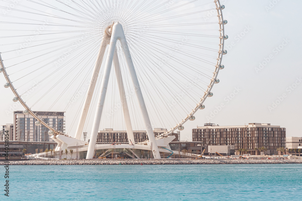Obraz premium One of the largest Ferris Wheels in the World is the Dubai Ain on bluewaters island. Top tourist attractions in the United Arab Emirates