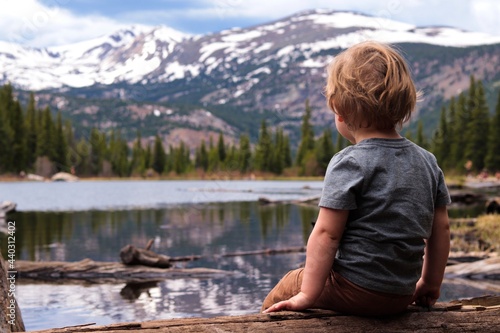 child on the lake