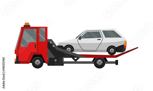 Tow truck. Flat faulty car loaded on a tow truck. Vehicle repair service which provides assistance damaged or salvaged cars