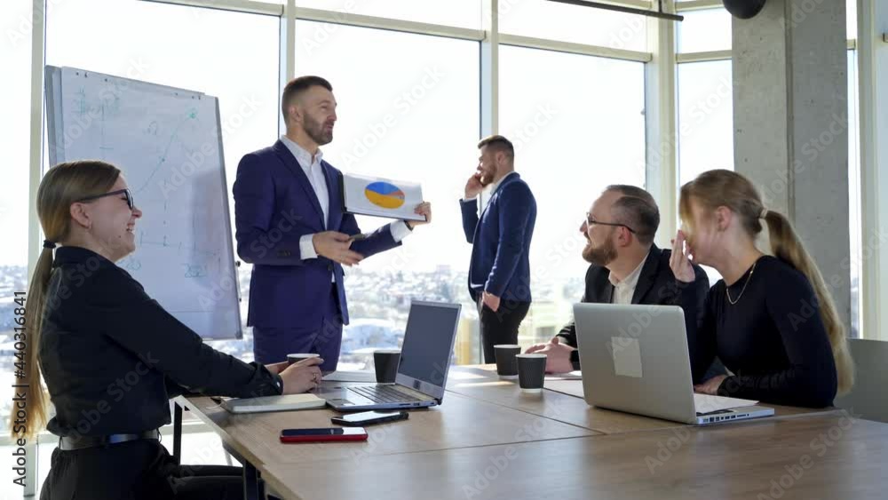 Group of business partners have meeting in modern office. People in suits talking about new project. Group of business partners have meeting in modern office. People in suits talking about new project.