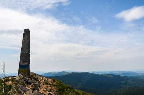 Fototapeta Naklejka Na Ścianę i Meble -  Rocky mountain peak of Pikuj against blue sky on summer day. Outdoor travel scene. East Beskidy, Carpathians Mountains, Ukraine