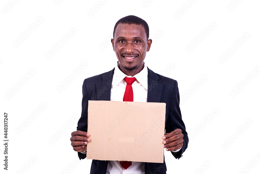 portrait of a businessman with an empty paper, smiling.