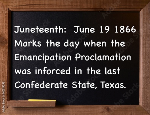 Photo of a small Chalkboard with a message written on the board.  The message is for National Holiday Juneteenth. 