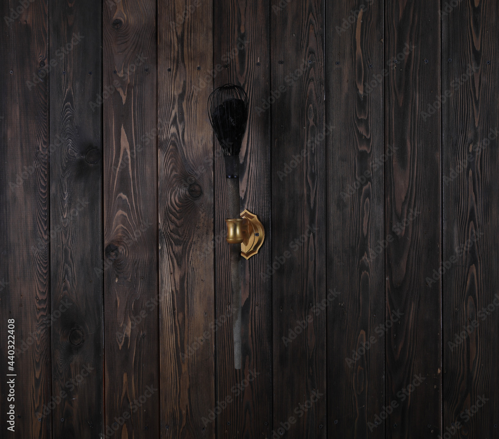 extinguished torch,torch on a wooden wall extinguished torch,torch on a wooden wall