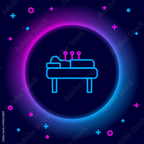 Glowing neon line Acupuncture therapy icon isolated on black background. Chinese medicine. Holistic pain management treatments. Colorful outline concept. Vector