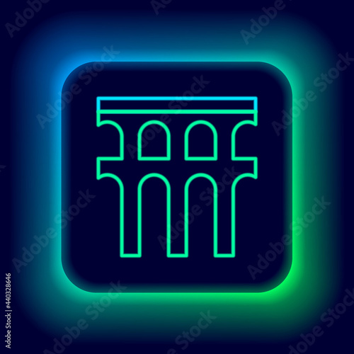Glowing neon line Aqueduct of Segovia, Spain icon isolated on black background. Roman Aqueduct building. National symbol of Spain. Colorful outline concept. Vector