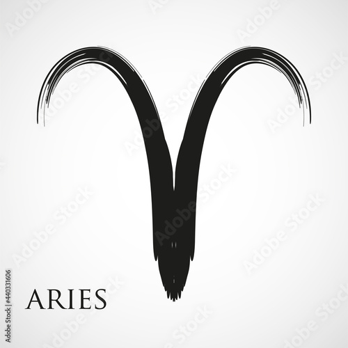 Aries zodiac symbol isolated on white background. Brush stroke Aries zodiac sign. Hand drawn vector illustration photo