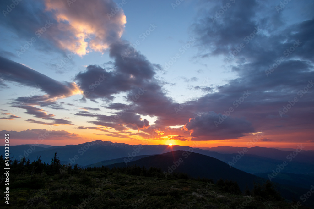Beautiful colorful panorama of sunrise in the Ukrainian Carpathians