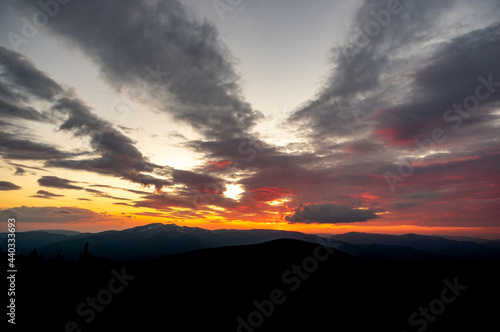 Beautiful colorful panorama of the sunset in the Carpathian mountains © onyx124