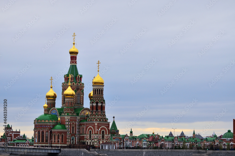 View of the Cathedral of The Epiphany in cloudy weather in the evening with a copy space. Russia Yoshkar-Ola 01.05.2021. High quality photo