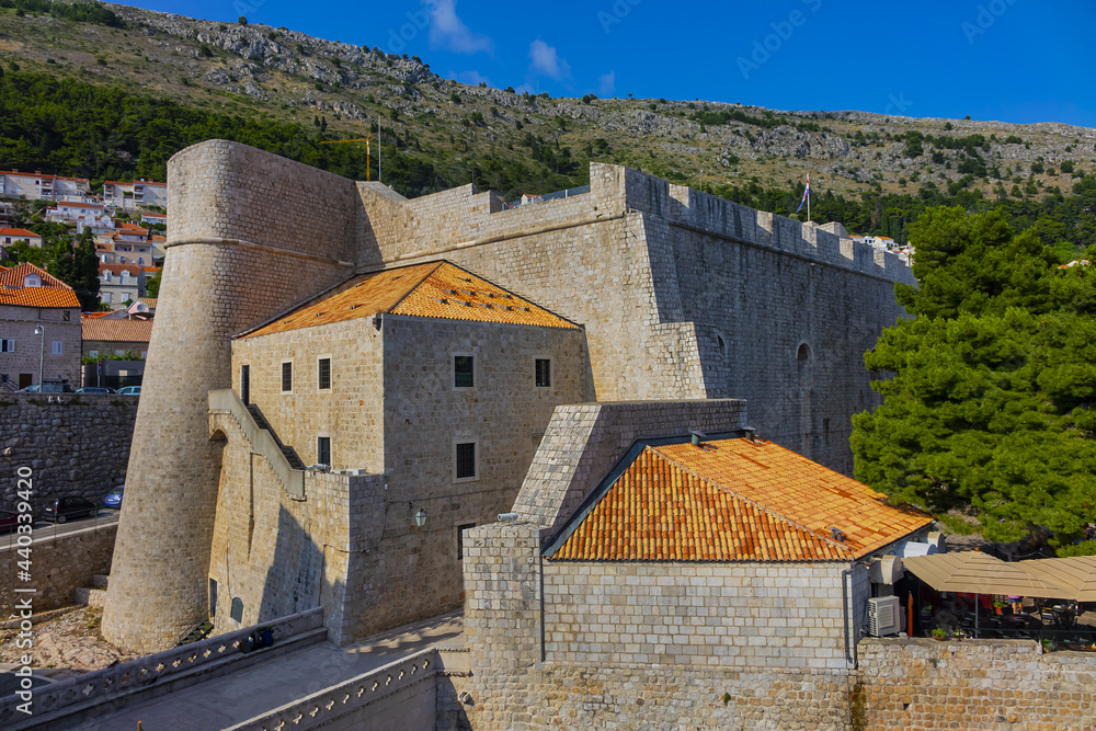 Fortified wall of medieval town Dubrovnik. Croatia. Dubrovnik on Adriatic Sea is one of most prominent tourist destinations, UNESCO World Heritage Site. Fortified wall of medieval town Dubrovnik. Croatia. Dubrovnik on Adriatic Sea is one of most prominent tourist destinations, UNESCO World Heritage Site.